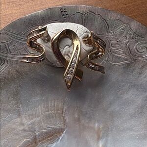 14k/10kGold and diamond pendant and earring set.